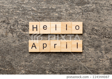 hello april word written on wood block. hello april text on table, concept hello april word written on wood block. hello april text on table, concept 114344087