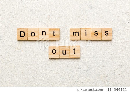 Don't miss out word written on wood block. Don't miss out text on cement table for your desing, Top view concept 114344111