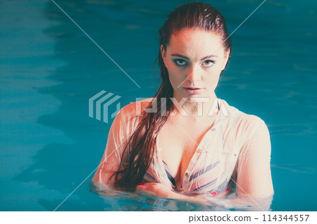 Portrait of mysterious seductive woman in water. Portrait of mysterious seductive woman in water. 114344557