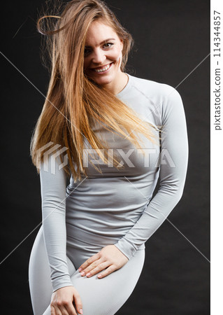 Sport fit woman in thermal clothes. 114344857