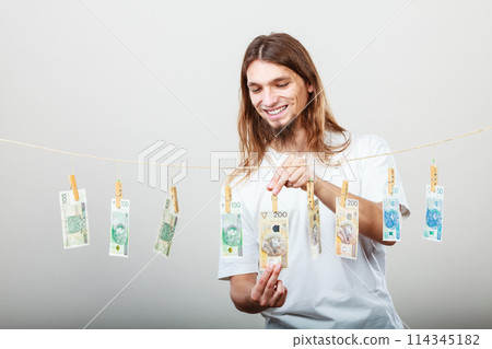 Rich man with laundry of money Rich man with laundry of money 114345182