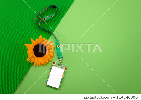 Sunflower lanyard, symbol of people with invisible or hidden disabilities. 114346300