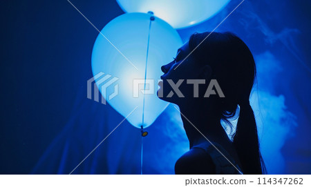 Mystic Profile Silhouette with Blue Lighting 114347262