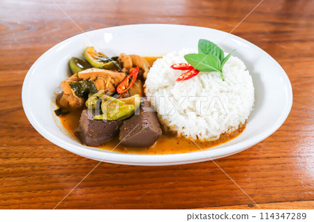 chicken curry , yellow curry chicken or chicken soup with rice 114347289