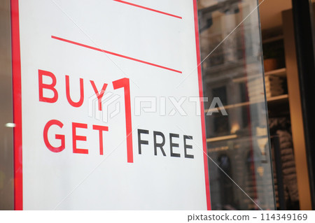 Large Sale text letters on white background on clothing store . 114349169