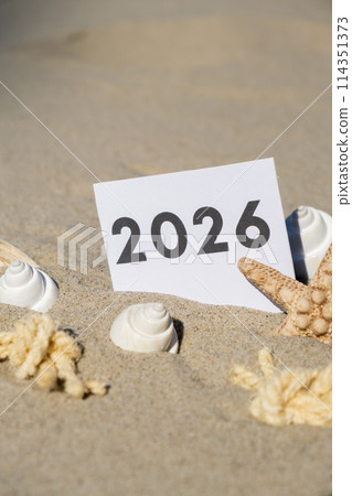 2026 text start new year symbol on paper greeting card on background of starfish summer vacation decor. Sandy beach sun coast. Holiday concept postcard. Getting away Travel 2026 text start new year symbol on paper greeting card on background of starfish summer vacation decor. Sandy beach sun coast. Holiday concept postcard. Getting away Travel 114351373