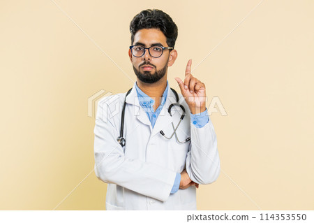 Displeased upset doctor man reacting to unpleasant awful idea, dissatisfied, shake head No, dislike Displeased upset doctor man reacting to unpleasant awful idea, dissatisfied, shake head No, dislike 114353550