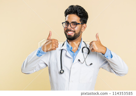 Doctor man raises thumbs up agrees or gives positive reply recommends advertisement likes good idea Doctor man raises thumbs up agrees or gives positive reply recommends advertisement likes good idea 114353585