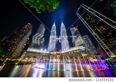 Fountain show at KLCC Park and Petronas Twin Towers, Kuala Lumpur, Malaysia Fountain show at KLCC Park and Petronas Twin Towers, Kuala Lumpur, Malaysia 114354119