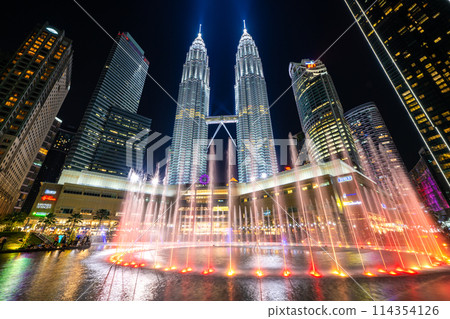 Fountain show at KLCC Park and Petronas Twin Towers, Kuala Lumpur, Malaysia Fountain show at KLCC Park and Petronas Twin Towers, Kuala Lumpur, Malaysia 114354126
