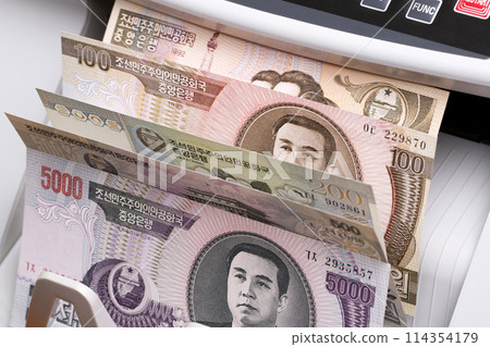 North Korean Won in a counting machine 114354179