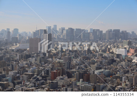 Nov 30 2023 metropolis with skyscrapers and crowded cityscape from above 114355334