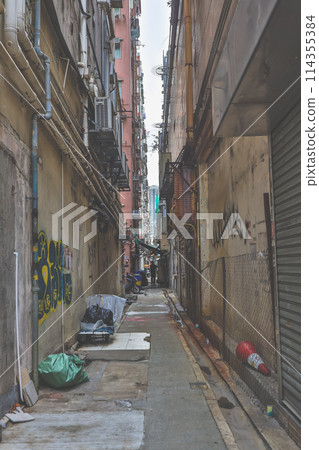 Narrow Alley in Kowloon Hong Kong Hong Kong May 5 2024 Narrow Alley in Kowloon Hong Kong Hong Kong May 5 2024 114355384