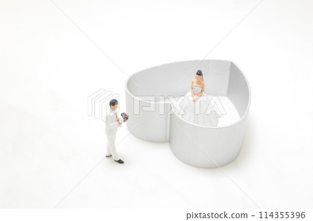 a mini of bridal couple with cross a mini of bridal couple with cross 114355396