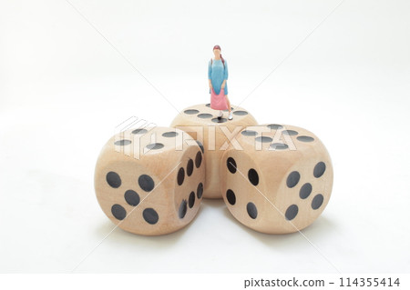 a mini lady figure with shopping bags and dice a mini lady figure with shopping bags and dice 114355414