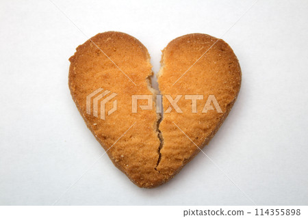 Cookie in the form of broken hearts - symbol of love Cookie in the form of broken hearts - symbol of love 114355898
