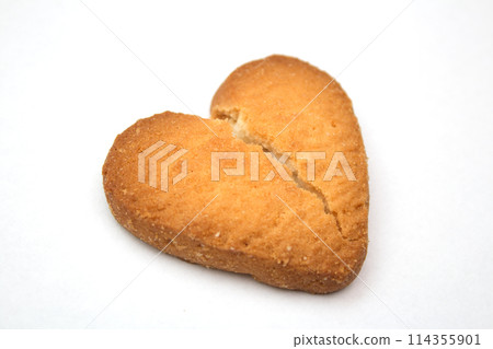 Cookie in the form of broken hearts - symbol of love Cookie in the form of broken hearts - symbol of love 114355901
