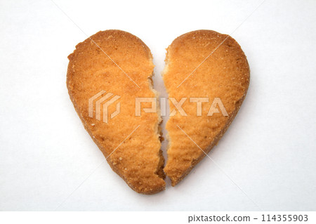 Cookie in the form of broken hearts - symbol of love Cookie in the form of broken hearts - symbol of love 114355903