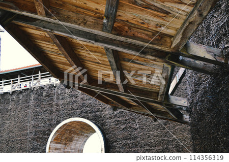 WIELICZKA, POLAND - JMay 2, 2022: Graduation tower, great inhalatorium in the resort near Krakow. It is made of wood and sloe branches to increase the salt concentration in brine. High quality photo 114356319