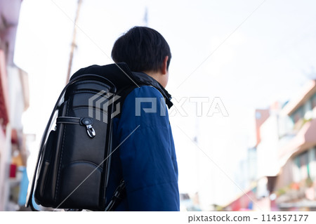 Elementary school student going to school Elementary school student going to school 114357177