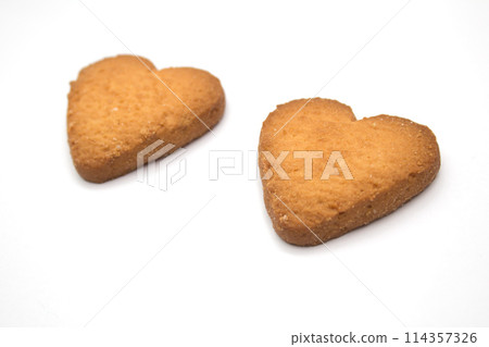 Two cookies in the form of hearts - symbol of love 114357326