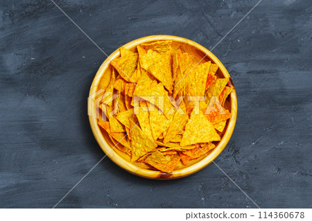 Yellow Bowl Filled With Tortilla Chips. Flat lay, close up 114360678
