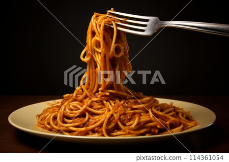 Fork with tasty pasta isolated on black 114361054