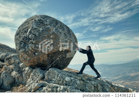a businessman in a suit is pushing a huge boulder uphill with tension 114361211