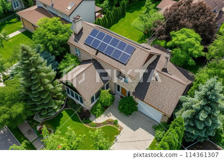 New suburban house with a photovoltaic system on the roof New suburban house with a photovoltaic system on the roof 114361307