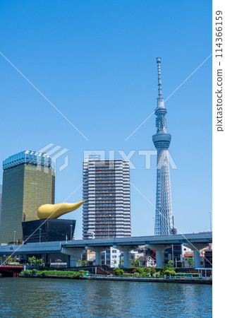 Cityscape of the Sumida River with clear blue sky and gentle flowing water | Japan | Tokyo Image 114366159