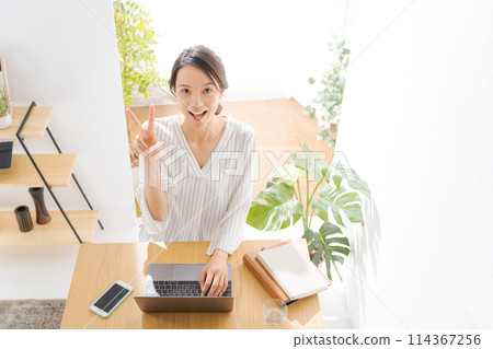 Woman working in telework 114367256