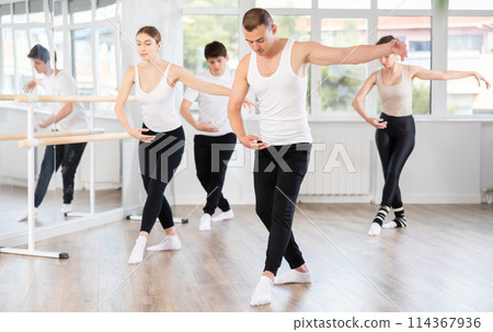 Group of dancers rehearsing ballet dance 114367936
