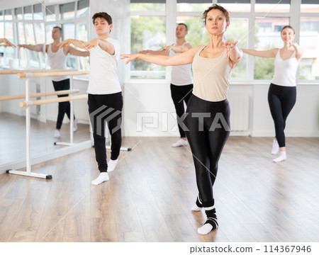 Group of dancers rehearsing ballet dance Group of dancers rehearsing ballet dance 114367946