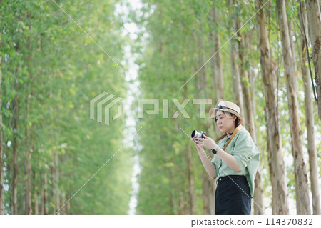 asian woman happy with travel and relax at outdoor on spring season asian woman happy with travel and relax at outdoor on spring season 114370832