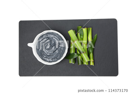 PNG,Fresh bamboo shoots with charcoal in the form of a paste, isolated on white background PNG,Fresh bamboo shoots with charcoal in the form of a paste, isolated on white background 114373170