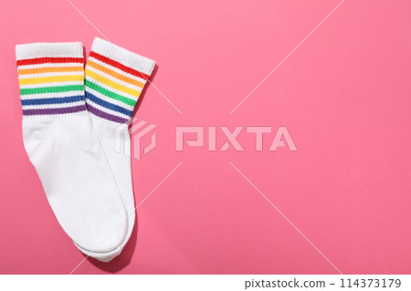 LGBT parade concept, colorful symbols on pink background. 114373179