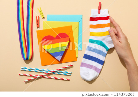 LGBT parade concept, free love symbol on light background. 114373205