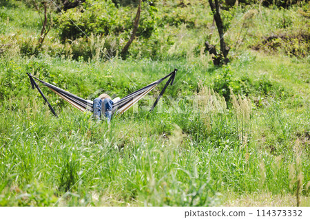 Woman living in the countryside Woman living in the countryside 114373332