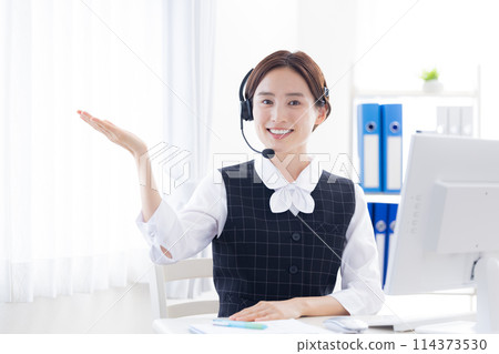 woman working in a call center woman working in a call center 114373530