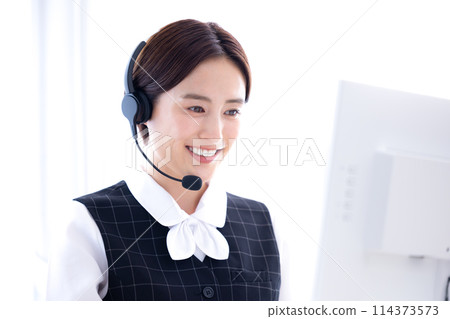 woman working in a call center woman working in a call center 114373573