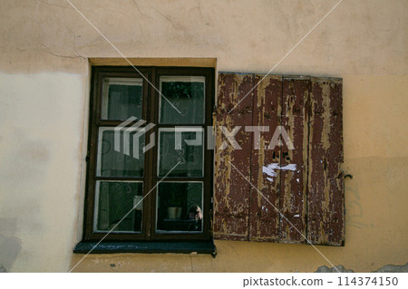 Wooden shutters, rustic building in Vilnius 114374150