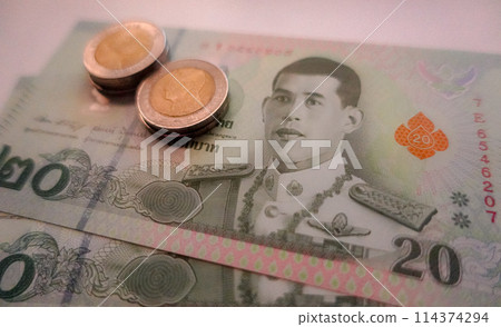 20 baht banknote and 10 baht coin, Thai money 20 baht banknote and 10 baht coin, Thai money 114374294