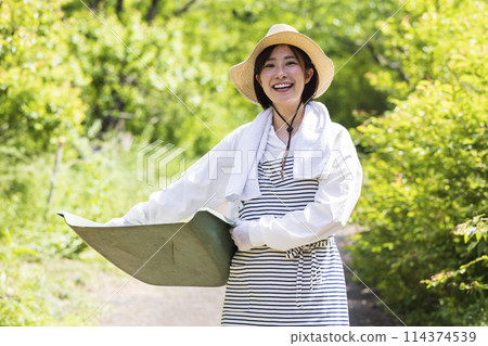 Woman living in the countryside Woman living in the countryside 114374539