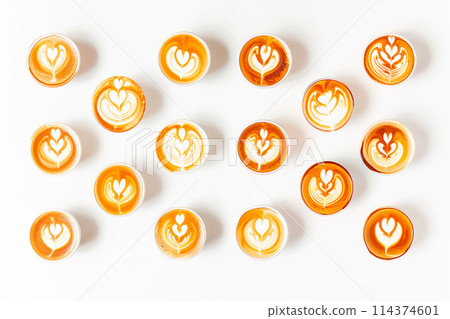 Coffee cups with latte art on white background, top view on white background Coffee cups with latte art on white background, top view on white background 114374601