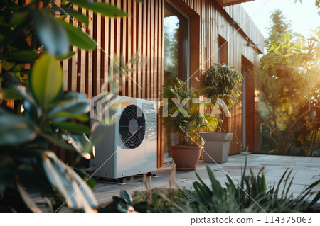 Air Heat Pump on Wooden Home at Sunset Air Heat Pump on Wooden Home at Sunset 114375063