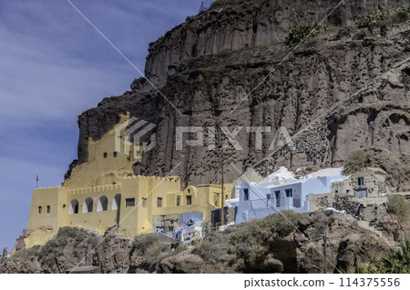 Greece, Santorini, colorful buildings on the cliff of the port of Fira 114375556
