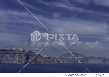 Greece, Santorini, view of cliffs and villages from the sea Greece, Santorini, view of cliffs and villages from the sea 114375649