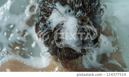 Woman Washing Hair with Shampoo Bubbles in Bath Woman Washing Hair with Shampoo Bubbles in Bath 114377514