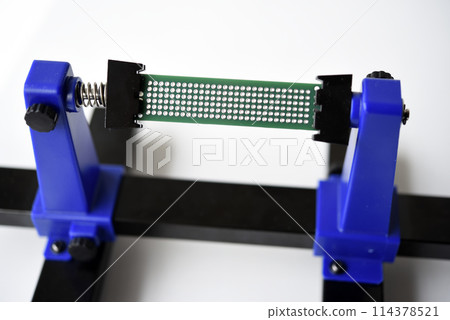 A printed circuit board for trace elements. Radio electronics. A holder for printed circuit boards. A printed circuit board for trace elements. Radio electronics. A holder for printed circuit boards. 114378521