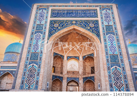 entrance portal decorated ceramic tiles with uzbek ornament islamic pattern of Muslim Barakhan madrasah. Hazrati Imam Architectural Complex in Tashkent, Uzbekistan 114378894